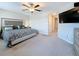 Bright main bedroom with accent wall and walk-in closet access at 841 Royal Empress Dr, Ruskin, FL 33570