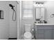 Modern bathroom with walk-in shower, subway tile, and updated fixtures at 9075 Waterash N Ln, Pinellas Park, FL 33782
