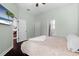 Bright bedroom with ensuite bathroom and ample closet space at 9075 Waterash N Ln, Pinellas Park, FL 33782
