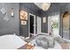Beautiful bathroom featuring gray walls, tile floors, white trim, modern decor, and a freestanding tub at 9075 Waterash N Ln, Pinellas Park, FL 33782