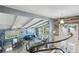 Bright, open living space featuring high ceilings, modern decor, and expansive windows showcasing the beautiful outdoors at 931 Gulf Blvd, Belleair Beach, FL 33786