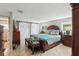 The large bedroom offers a peaceful setting with wood floors, walk-in closet, and ensuite bathroom at 931 Gulf Blvd, Belleair Beach, FL 33786