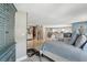 Spacious main bedroom boasts a large walk-in closet, wood floors, and serene decor for a relaxing retreat at 931 Gulf Blvd, Belleair Beach, FL 33786