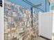 Modern outdoor shower with decorative tile, great for rinsing off after the beach or pool at 931 Gulf Blvd, Belleair Beach, FL 33786