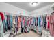 Spacious walk-in closet featuring wire shelving and ample storage for clothes, shoes, and accessories at 10833 Breaking Rocks Dr, Tampa, FL 33647