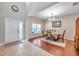 Inviting dining room features hardwood floors and a neutral color palette at 10833 Breaking Rocks Dr, Tampa, FL 33647