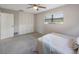 Bedroom with lots of natural light, spacious closet, and ceiling fan at 11698 75Th Ave, Seminole, FL 33772