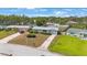 Charming single-story home with a well-maintained lawn and driveway, showcasing curb appeal at 11698 75Th Ave, Seminole, FL 33772