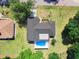 Aerial view of a home with a private swimming pool at 1178 Sultana St, Port Charlotte, FL 33952