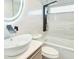 Modern bathroom showcasing stylish fixtures, a walk-in shower, a soaking tub, and elegant lighting at 1178 Sultana St, Port Charlotte, FL 33952