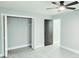 Comfortable bedroom offering closet space, a ceiling fan, and neutral décor at 1178 Sultana St, Port Charlotte, FL 33952
