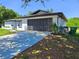 Charming single-story home features a two-car garage and a well-maintained front yard at 1178 Sultana St, Port Charlotte, FL 33952