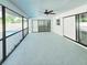 A spacious screened patio providing an outdoor entertainment area with views of the pool and yard at 1178 Sultana St, Port Charlotte, FL 33952