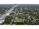 An aerial view highlights the property's nearby park, trees, and neighborhood at 1206 E Frierson Ave # B, Tampa, FL 33603