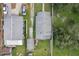 An aerial view of two houses with driveways, and mature trees at 1206 E Frierson Ave # B, Tampa, FL 33603