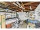 Garage featuring exposed wooden beams, and offering ample space for storage and projects at 1206 E Frierson Ave # B, Tampa, FL 33603
