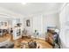 Bright living room with hardwood floors, large windows, and modern decor at 1206 E Frierson Ave # B, Tampa, FL 33603