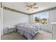 Bedroom with large window that provides bright, natural light at 12222 Meadowbrook Ln, Hudson, FL 34667