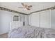 Bedroom includes a large closet and a decorative border at 12222 Meadowbrook Ln, Hudson, FL 34667