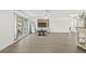 Spacious living area with plenty of room to spread out and new floors at 12222 Meadowbrook Ln, Hudson, FL 34667