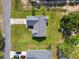 Aerial view of the house showing the driveway and roof at 13227 Quigley Ave, Weeki Wachee, FL 34614