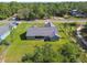 Aerial view of home showing outdoor spaces and landscaping at 13227 Quigley Ave, Weeki Wachee, FL 34614