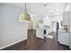 Open-concept kitchen with granite countertops, modern appliances, and spacious layout at 13227 Quigley Ave, Weeki Wachee, FL 34614