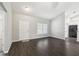 Well-lit living room showcasing modern floors and a bright, airy atmosphere at 13227 Quigley Ave, Weeki Wachee, FL 34614