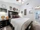 Cozy bedroom with nautical-themed decor, soft carpet, and modern fixtures at 1445 Stonehenge Way, Palm Harbor, FL 34683