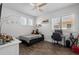 A room featuring decor and furniture, including a bed and study desk at 14855 Renaissance Ave, Odessa, FL 33556