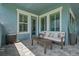 Outdoor seating area with light blue walls, wooden furniture, and well lit from multiple windows at 14855 Renaissance Ave, Odessa, FL 33556