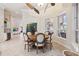 Dining room features a round table and a stained glass window at 15110 Kestrelglen Way, Lithia, FL 33547