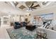Open floor plan with kitchen, living and dining area provides seamless flow for living and entertaining at 15110 Kestrelglen Way, Lithia, FL 33547