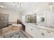 Luxurious main bathroom with a soaking tub, walk-in shower, and dual vanities at 15110 Kestrelglen Way, Lithia, FL 33547
