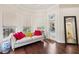 Cozy sitting area in main bedroom with views of the pool and access to the lanai at 15110 Kestrelglen Way, Lithia, FL 33547