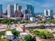 Aerial view of townhome with cityscape background at 1529 N Morgan St, Tampa, FL 33602