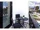 City view from the balcony, complemented with black furniture and an exterior door at 1529 N Morgan St, Tampa, FL 33602