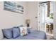Bedroom featuring a full sized bed with patio access and plenty of natural light at 1529 N Morgan St, Tampa, FL 33602