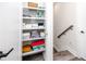 Organized linen closet with ample shelving and neatly folded towels and household items at 1529 N Morgan St, Tampa, FL 33602