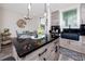 Kitchen area with island seating, stainless steel sink, and dining table in background at 1529 N Morgan St, Tampa, FL 33602