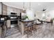 Modern kitchen with island seating and open floor plan into the living area at 1529 N Morgan St, Tampa, FL 33602