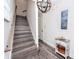 Inviting staircase featuring hardwood floors, modern lighting, and decorative accents at 1529 N Morgan St, Tampa, FL 33602