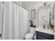 Bathroom vanity featuring modern sink and decor with a toilet and shower/tub at 15934 Sorawater Dr, Lithia, FL 33547