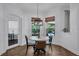 Quaint breakfast nook with a round table, natural light, and view of the backyard at 15934 Sorawater Dr, Lithia, FL 33547