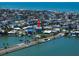 Aerial view of this modern home with waterfront access and close proximity to the beaches at 16047 Redington Dr, Redington Beach, FL 33708