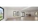Spacious bonus room with natural light, modern doors, and views of the water at 16047 Redington Dr, Redington Beach, FL 33708