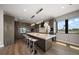 Stylish kitchen with a large island, modern appliances, and pendant lighting at 16047 Redington Dr, Redington Beach, FL 33708