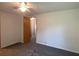Bedroom featuring neutral carpet and ceiling fan, offering a calm, relaxing space at 1710 7Th Sw St # 85, Ruskin, FL 33570