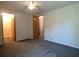 Bedroom offering ample space and multiple doorways leading to other rooms and closets at 1710 7Th Sw St # 85, Ruskin, FL 33570