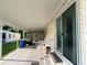 Extended covered carport and patio area, perfect for outdoor living, providing ample space for parking and relaxing at 1710 7Th Sw St # 85, Ruskin, FL 33570